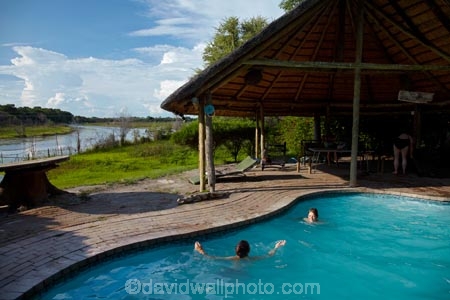 Africa;Botswana;child;children;delta;deltas;Endorheic-basin;families;family;family-holiday;family-holidays;holiday;holidays;inland-delta;internal-drainage-systems;lodge;lodges;Maun;Okavango;Okavango-Delta;Okavango-River-Lodge;Okavango-Swamp;people;person;pool;pools;river-delta;Seven-Natural-Wonders-of-Africa;Southern-Africa;swim;swimmer;swimmers;swimming-pool;swimming-pools;tourism;tourist;tourists