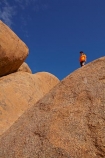 Africa;boy;boys;child;children;climb;climber;climbing;Erongo-Region;geological;geology;Groot-Spitzkop;Namib-Desert;Namibia;orange;person;rock;rock-formation;rock-formations;rock-outcrop;rock-outcrops;rock-tor;rock-torr;rock-torrs;rock-tors;rocks;skies;sky;Southern-Africa;Spitzkop;Spitzkoppe;stone;unusual-natural-feature;unusual-natural-features