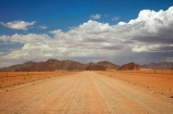 707-road;Africa;African;approaching-storm;approaching-storms;black-cloud;black-clouds;cloud;clouds;cloudy;D707-road;dark-cloud;dark-clouds;desert;deserts;dry;gravel-road;gravel-roads;gray-cloud;gray-clouds;grey-cloud;grey-clouds;metal-road;metal-roads;metalled-road;metalled-roads;Namib-Desert;Namibia;rain-cloud;rain-clouds;rain-storm;rain-storms;road;roads;Southern-Africa;Southern-Namiba;storm;storm-cloud;storm-clouds;storms;thunder-storm;thunder-storms;thunderstorm;thunderstorms;unpaved-road;unpaved-roads;weather