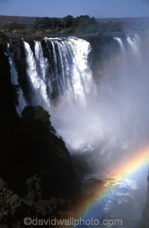 Victoria-Falls;Zambezi-River;Zimbabwe;Zambia;Africa;African;Southern-Africa;waterfall;waterfalls;water;nature;natural;wonder-of-the-world;world-wonder;seven-natural-wonders-of-the-wo;mist;misty;spary;refraction;high;power;powerful;vertical;;flow;chasm;global-warming;gush;cliff;cliffs;bluff;bluffs;crevasse;crevasses;falling;falls;fall;phenomena;phenomenon;precipice;precipices;rainbow;rainbows
