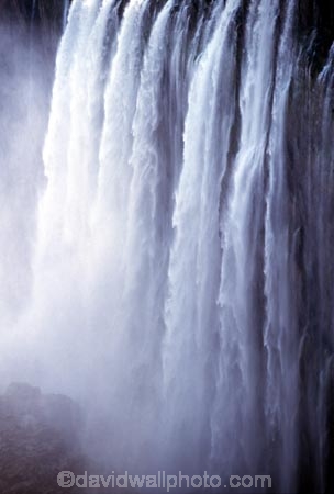 Victoria-Falls;Zambezi-River;Zimbabwe;Zambia;Africa;African;Southern-Africa;waterfall;waterfalls;water;nature;natural;wonder-of-the-world;world-wonder;seven-natural-wonders-of-the-wo;mist;misty;spary;refraction;high;power;powerful;vertical;;flow;chasm;global-warming;gush;cliff;cliffs;bluff;bluffs;crevasse;crevasses;falling;falls;fall;phenomena;phenomenon;precipice;precipices