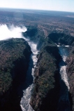 Victoria-Falls;Zambezi-River;Zimbabwe;Zambia;Africa;African;Southern-Africa;aerial;waterfall;waterfalls;water;nature;natural;wonder-of-the-world;world-wonder;seven-natural-wonders-of-the-wo;mist;misty;spary;refraction;high;power;powerful;vertical;;flow;chasm;global-warming;gush;cliff;cliffs;bluff;bluffs;crevasse;crevasses;falling;falls;fall;phenomena;phenomenon;precipice;precipices;aerial;aerials