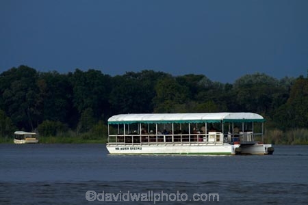 Africa;approaching-storm;approaching-storms;black-cloud;black-clouds;boat;boat-tour;boat-tours;boat-trip;boat-trips;boats;cloud;clouds;cloudy;cruise;cruises;dark-cloud;dark-clouds;gray-cloud;gray-clouds;grey-cloud;grey-clouds;launch;launches;pleasure-boat;pleasure-boats;rain-cloud;rain-clouds;rain-storm;rain-storms;river;rivers;Southern-Africa;storm;storm-cloud;storm-clouds;storms;thunder-storm;thunder-storms;thunderstorm;thunderstorms;tour-boat;tour-boats;tourism;tourist;tourist-boat;tourist-boats;V.F.;VF;Vic-Falls;Vic.-Falls;Victoria-Falls;weather;Zambesi;Zambesi-River;Zambeze;Zambeze-River;Zambezi;Zambezi-River;Zambia;Zimbabwe