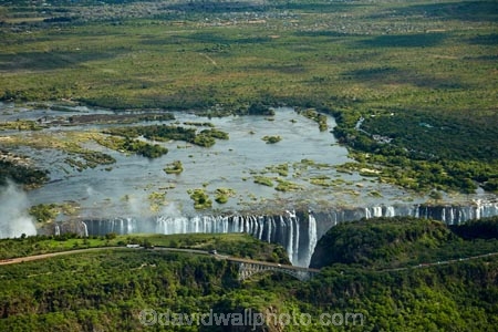 aerial;aerial-image;aerial-images;aerial-photo;aerial-photograph;aerial-photographs;aerial-photography;aerial-photos;aerial-view;aerial-views;aerials;Africa;Batoka-Gorge;Batoka-Gorges;bridge;bridges;cascade;cascades;chasm;chasms;fall;falls;First-Gorge;gorge;gorges;international-border;international-borders;mist;Mosi-oa-Tunya;Mosi_oa_Tunya;Mosi_oa_Tunya-National-Park;natural;natural-wonders-of-the-world;nature;ravine;ravines;river;rivers;scene;scenic;seven-natural-wonders;seven-natural-wonders-of-the-world;seven-wonders-of-the-natural-world;seven-wonders-of-the-world;Southern-Africa;spray;the-Smoke-that-Thunders;UN-world-heritage-area;UN-world-heritage-site;UNESCO-World-Heritage-area;UNESCO-World-Heritage-Site;united-nations-world-heritage-area;united-nations-world-heritage-site;V.F.;VF;Vic-Falls;Vic.-Falls;Victoria-Falls;Victoria-Falls-Bridge;Victoria-Falls-National-Park;water;water-fall;water-falls;waterfall;waterfalls;wet;world-heritage;world-heritage-area;world-heritage-areas;World-Heritage-Park;World-Heritage-site;World-Heritage-Sites;Zambesi;Zambesi-River;Zambeze;Zambeze-River;Zambezi;Zambezi-River;Zambia;Zimbabwe;Zimbabwe-Border