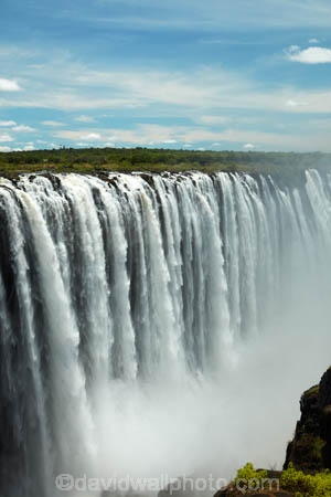 Africa;cascade;cascades;chasm;chasms;fall;falls;international-border;international-borders;Mosi_oa_Tunya;natural;natural-wonders-of-the-world;nature;ravine;ravines;river;rivers;scene;scenic;seven-natural-wonders;seven-natural-wonders-of-the-world;seven-wonders-of-the-natural-world;seven-wonders-of-the-world;Southern-Africa;spray;the-Smoke-that-Thunders;UN-world-heritage-area;UN-world-heritage-site;UNESCO-World-Heritage-area;UNESCO-World-Heritage-Site;united-nations-world-heritage-area;united-nations-world-heritage-site;V.F.;VF;Vic-Falls;Vic.-Falls;Victoria-Falls;Victoria-Falls-National-Park;water;water-fall;water-falls;waterfall;waterfalls;wet;world-heritage;world-heritage-area;world-heritage-areas;World-Heritage-Park;World-Heritage-site;World-Heritage-Sites;Zambesi;Zambesi-River;Zambeze;Zambeze-River;Zambezi;Zambezi-River;Zambia;Zimbabwe