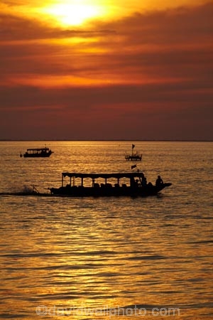 Asia;boat;boats;Cambodia;Cambodian-floating-village;Cambodian-floodplain;Cambodian-village;Chong-Khneas;Chong-Khneas-Floating-Village;Chong-Khnies;Chong-Kneas;Chong-Kneas-Floating-Village;dusk;evening;Floating-Village;Floating-Villages;freshwater-lake;freshwater-lakes;Indochina-Peninsula;Kampuchea;Kingdom-of-Cambodia;lake;lakes;long-boat;long-boats;long-tail-boat;long-tailed-boat;long_tail-boat;long_tailed-boat;Lower-Mekong-Basin;Mekong-Plain;night;night_time;nightfall;orange;passenger-boat;passenger-boats;Siem-Reap;Siem-Reap-Province;Southeast-Asia;sunset;sunsets;Tonle-Sap;Tonle-Sap-Lake;TonlÃ©-Sap;TonlÃ©-Sap-Lake;tour-boat;tour-boats;tourism;tourist-boat;tourist-boats;tourists;twilight;UNESCO-Biosphere-Reserve