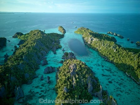 Indonesia;aerial;aerial-photo;aerial-photograph;aerial-photographs;aerial-photography;aerial-photos;aerial-view;aerial-views;aerials;drone-aerial;drone;Misool;Raja-Ampat;West-Papua;Southwest-Papua;Misool-Is;Misool-Island;karst-landscape;limestone-karsts;karst;karsts;limestone;topography;landscape;landscapes;island;islands;Misool-archipelago;Coral-reef;aqua;aquamarine;blue;clean-water;clear-water;coast;cobalt-blue;cobalt-ultramarine;cobaltultramarine;coral;coral-reefs;corals;reef;reefs;teal-blue;tropical-island;tropical-islands;tropical-reef;tropical-reefs;turquoise;inner-archipelago;archipelago;Yapap;tourism;travel