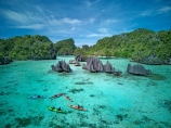 Namlol;Namlol-Lagoon;Namlol-Island;kayak;kayaking;kayaks;adventure;adventure-tourism;boat;boats;canoe;canoeing;canoes;coast;coastal;coastline;coastlines;coasts;ocean;oceans;sea;sea-kayak;sea-kayaking;sea-kayaks;kayaker;kayakers;paddle;paddler;paddlers;paddling;people;person;sea-kayaker;sea-kayakers;Reef;Coral-reef;coral;coral-reefs;corals;reef;reefs;aqua;aquamarine;blue;clean-water;clear-water;coast;cobalt-blue;cobalt-ultramarine;cobalt;ultramarine;teal-blue;tropical-island;tropical-islands;tropical-reef;tropical-reefs;turquoise;karst-landscape;limestone-karsts;karst;karsts;limestone;topography;landscape;landscapes;island;islands;karst-formations;karst-formation;Indonesia;aerial;aerial-photo;aerial-photograph;aerial-photographs;aerial-photography;aerial-photos;aerial-view;aerial-views;aerials;drone-aerial;drone;Misool;Raja-Ampat;West-Papua;Southwest-Papua;Misool-Is;Misool-Island;karst-landscape;landscape;landscapes;island;islands;outer-archipelago;archipelago;Misool-archipelago;paradise;tourism;travel