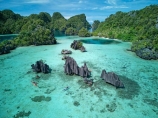 Namlol;Namlol-Lagoon;Namlol-Island;kayak;kayaking;kayaks;adventure;adventure-tourism;boat;boats;canoe;canoeing;canoes;coast;coastal;coastline;coastlines;coasts;ocean;oceans;sea;sea-kayak;sea-kayaking;sea-kayaks;kayaker;kayakers;paddle;paddler;paddlers;paddling;people;person;sea-kayaker;sea-kayakers;Reef;Coral-reef;coral;coral-reefs;corals;reef;reefs;aqua;aquamarine;blue;clean-water;clear-water;coast;cobalt-blue;cobalt-ultramarine;cobalt;ultramarine;teal-blue;tropical-island;tropical-islands;tropical-reef;tropical-reefs;turquoise;karst-landscape;limestone-karsts;karst;karsts;limestone;topography;landscape;landscapes;island;islands;karst-formations;karst-formation;Indonesia;aerial;aerial-photo;aerial-photograph;aerial-photographs;aerial-photography;aerial-photos;aerial-view;aerial-views;aerials;drone-aerial;drone;Misool;Raja-Ampat;West-Papua;Southwest-Papua;Misool-Is;Misool-Island;karst-landscape;landscape;landscapes;island;islands;outer-archipelago;archipelago;Misool-archipelago;paradise;tourism;travel