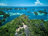Indonesia;aerial;aerial-photo;aerial-photograph;aerial-photographs;aerial-photography;aerial-photos;aerial-view;aerial-views;aerials;drone-aerial;drone;Misool;Raja-Ampat;West-Papua;Southwest-Papua;Misool-Is;Misool-Island;karst-landscape;limestone-karsts;karst;karsts;limestone;topography;landscape;landscapes;island;islands;Misool-archipelago;Coral-reef;aqua;aquamarine;blue;clean-water;clear-water;coast;cobalt-blue;cobalt-ultramarine;cobaltultramarine;coral;coral-reefs;corals;reef;reefs;teal-blue;tropical-island;tropical-islands;tropical-reef;tropical-reefs;turquoise;tourist;tourists;tourism;people;Dafalen-Peak;Dafalen-Island;paradise;tourism;travel