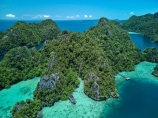 Indonesia;aerial;aerial-photo;aerial-photograph;aerial-photographs;aerial-photography;aerial-photos;aerial-view;aerial-views;aerials;drone-aerial;drone;Misool;Raja-Ampat;West-Papua;Southwest-Papua;Misool-Is;Misool-Island;karst-landscape;limestone-karsts;karst;karsts;limestone;topography;landscape;landscapes;island;islands;Misool-archipelago;Coral-reef;aqua;aquamarine;blue;clean-water;clear-water;coast;cobalt-blue;cobalt-ultramarine;cobaltultramarine;coral;coral-reefs;corals;reef;reefs;teal-blue;tropical-island;tropical-islands;tropical-reef;tropical-reefs;turquoise;paradise;tourism;travel