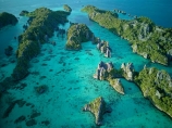 Indonesia;aerial;aerial-photo;aerial-photograph;aerial-photographs;aerial-photography;aerial-photos;aerial-view;aerial-views;aerials;drone-aerial;drone;Misool;Raja-Ampat;West-Papua;Southwest-Papua;Misool-Is;Misool-Island;karst-landscape;limestone-karsts;karst;karsts;limestone;topography;landscape;landscapes;island;islands;Misool-archipelago;Coral-reef;aqua;aquamarine;blue;clean-water;clear-water;coast;cobalt-blue;cobalt-ultramarine;cobaltultramarine;coral;coral-reefs;corals;reef;reefs;teal-blue;tropical-island;tropical-islands;tropical-reef;tropical-reefs;turquoise;inner-archipelago;archipelago;Yapap;tourism;travel