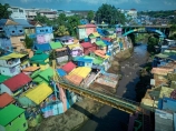 Indonesia;aerial;aerial-photo;aerial-photograph;aerial-photographs;aerial-photography;aerial-photos;aerial-view;aerial-views;aerials;drone-aerial;drone;Malang;Java;East-Java;Indonesia;Brantas-River;Roof;roofs;rooves;Kampung-Warna-Warni;Kampung;Warna-Warni;Kampung-Warna_Warni;Warna_Warni;Kampung-Tridi;Tridi;bridge;bridges;pedestrian-bridge;pedestrian-bridges;road-bridge;road-bridges;traffic-bridge;traffic-bridges;tourism;travel;Asia;South-East-Asia;Southeast-Asia