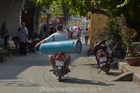 Asia;Asian;bike;biker;bikers;bikes;Central-Sea-region;Hi-An;Hoi-An;Hoi-An-Old-Town;Hoian;Indochina;large-gas-cylinder;motorbike;motorbikes;motorcycle;motorcycles;motorcyclist;motorcyclists;motorscooter;motorscooters;old-town;overload;overloaded;people;person;scooter;scooters;South-East-Asia;Southeast-Asia;step_through;step_throughs;street;street-scene;street-scenes;streets;UN-world-heritage-area;UN-world-heritage-site;UNESCO-World-Heritage-area;UNESCO-World-Heritage-Site;united-nations-world-heritage-area;united-nations-world-heritage-site;Vietnam;Vietnamese;world-heritage;world-heritage-area;world-heritage-areas;World-Heritage-Park;World-Heritage-site;World-Heritage-Sites