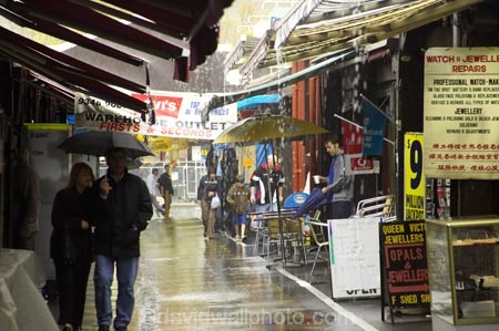 australasian;Australia;australian;cloudburst;commerce;commercial;deluge;downpour;downpours;market;market-place;market_place;marketplace;markets;Melbourne;pelting;pouring;Queen-Victoria-Market;rain;rainfall;rainstorm;rainy;retail;retailer;retailers;shop;shopping;shops;shower;showers;stall;stalls;steet-scene;street-scene;street-scenes;torrent;torrents;umbrella;umbrellas;Victoria;water;weather;wet