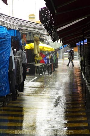 alley;australasian;Australia;australian;cloudburst;commerce;commercial;deluge;downpour;downpours;market;market-place;market_place;marketplace;markets;Melbourne;pelting;pouring;Queen-Victoria-Market;rain;rainfall;rainstorm;rainy;retail;retailer;retailers;shop;shopping;shops;shower;showers;stall;stalls;steet-scene;street-scene;street-scenes;torrent;torrents;umbrella;umbrellas;Victoria;water;weather;wet