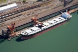 aerial;aerial-photo;aerial-photograph;aerial-photographs;aerial-photography;aerial-photos;aerial-view;aerial-views;aerials;Australasia;Australia;Australian;bulk-carriers;cargo;Carrington-Coal-Terminal;climate-change;coal;coal-depot;coal-industry;coal-ship;coal-ships;coal-train;coal-trains;coal-wagon;coal-wagons;commodities;commodity;energy;export;exporters;exporting;exports;fossil-fuel;fossil-fuels;freight;freighter;freighters;freights;fuel;global-warming;Hunter-River;industrial;industry;N.S.W.;natural;New-South-Wales;Newcastle;Newcastle-Harbor;Newcastle-Harbour;non-renewable;non_renewable;non_sustainable;nonrenewable;nonsustainable;NSW;Ocean-Planet;port;Port-of-Newcastle;Port-Waratah-Coal-Services-Limited;ports;power;PWCS;resource;ship;shipping;ships;trade;wharf;wharves