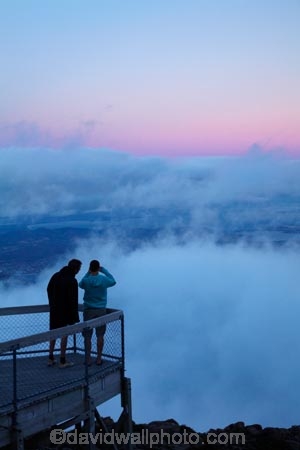 above-the-clouds;Australasian;Australia;Australian;cloud;cloudy;dusk;evening;Hobart;Island-of-Tasmania;Mount-Wellington;Mt-Wellington;Mt.-Wellington;night;night-time;people;pink;public-viewing-point;State-of-Tasmania;Tas;Tasmania;tourist;tourists;twilight;viewing-point;viewpoint