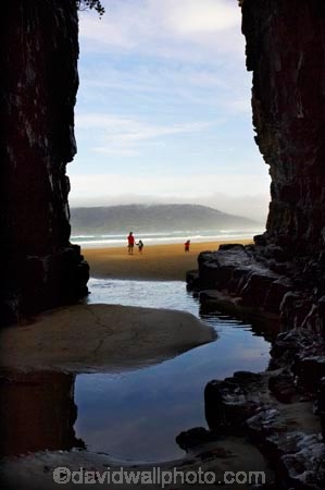 beach;beaches;Cathedral-Cave;cathedral-caves;catlins;Catlins-Coast;cave;cavern;caverns;cavers;caves;caving;coast;coastal;coastline;explore;explorers;exploring;geological;geology;grotto;grottos;New-Zealand;people;person;reflection;reflections;rock-formation;rock-formations;sand;sandy;scenic;shore;shoreline;South-Island;south-otago;southland;stone