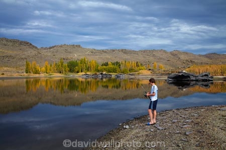 Alexandra;autuminal;autumn;autumn-colour;autumn-colours;autumnal;boy;boys;Butchers-Dam;Butchers-Dam;calm;Central-Otago;color;colors;colour;colours;dam;dams;deciduous;fall;fisher;fisherman;fishermen;fishing;gold;golden;lake;lakes;leaf;leaves;model-release;model-released;N.Z.;New-Zealand;NZ;Otago;placid;quiet;reflected;reflection;reflections;S.I.;season;seasonal;seasons;serene;SI;smooth;South-Is;South-Island;Sth-Is;still;tranquil;tree;trees;water;yellow