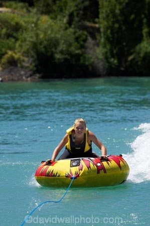 adventure;b1a5025;bannockburn;biscuiting;central;Central-Otago;dunstan;exciting;exhilaration;fast;fun;girl;girls;happy;hot;inflatable-tube;inner-tube;inner-tubing;inner_tubing;island;lake;Lake-Dunstan;lakes;leisure;N.Z.;new;new-zealand;NZ;otago;play;playing;recreation;S.I.;SI;south;South-Is;South-Is.;South-Island;speed;summer;Summertime;teenager;teenagers;thrill;Thrilling;tube;tubing;water;water-biscuit;water-sport;water-sports;watersport;watersports;wet;zealand