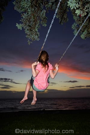 10-year-old;10-years-old;9-year-old;9-years-old;child;children;coast;coastal;Coromandel;Coromandel-Peninsula;dusk;evening;fill-flash;fill_flash;fillflash;Firth-of-Thames;fun;girl;girls;happy;joy;kid;kids;kiwi-icon;kiwi-icons;kiwiana;little-girl;little-girls;N.I.;N.Z.;New-Zealand;NI;nightfall;nine-year-old;nine-years-old;North-Is;North-Is.;North-Island;NZ;orange;outdoor;outside;people;person;play;playing;Pohutukawa-Tree;Pohutukawa-Trees;rope-swing;rope-swings;shore;sky;summer;sunset;sunsets;swing;swinging;swings;Tararu;ten-year-old;ten-years-old;Thames;Thames-Coast;twilight;Waikato;young-girl;young-girls