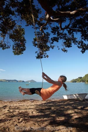 10-year-old;10-years-old;9-year-old;9-years-old;beach;beaches;child;children;coast;coastal;Coromandel;Coromandel-Peninsula;fun;girl;girls;happy;joy;kid;kids;kiwi-icon;kiwi-icons;kiwiana;little-girl;little-girls;N.I.;N.Z.;New-Zealand;NI;nine-year-old;nine-years-old;North-Is;North-Is.;North-Island;NZ;Oamaru-Bay;outdoor;outside;people;person;play;playing;Pohutukawa-Tree;Pohutukawa-Trees;rope-swing;rope-swings;shore;summer;swing;swinging;swings;ten-year-old;ten-years-old;Waikato;young-girl;young-girls