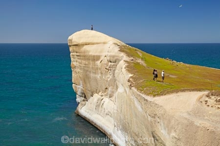 bluff;bluffs;cliff;cliffs;coast;coastal;coastal-erosion;coastline;coastlines;coasts;Dunedin;N.Z.;New-Zealand;NZ;ocean;oceans;Otago;Pacific-Ocean;people;person;S.I.;sandstone;sea;sea-cliff;sea-cliffs;seas;shore;shoreline;shorelines;shores;SI;South-Is;South-Is.;South-Island;summer;tourism;tourist;tourists;Tunnel-Beach;water
