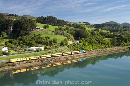 aerial;aerial-photo;aerial-photograph;aerial-photographs;aerial-photography;aerial-photos;aerial-view;aerial-views;aerials;Blanket-bay;calm;carriage;carriages;containers;Dunedin;harbor;harbors;harbour;harbours;N.Z.;New-Zealand;NZ;Otago;Otago-Harbor;Otago-Harbour;passenger-train;passenger-trains;placid;quiet;rail;railroad;railroads;rails;railway;railways;reflection;reflections;S.I.;Seasider-Train;serene;SI;sightseeing-train;smooth;South-Is.;South-Island;still;The-Seasider-Train;tourism;track;tracks;train;trains;tranquil;transport;transportation;travel;water