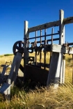 abandoned;Canton-Stamping-Battery;cog-wheels;cogs;crush;crusher;deserted;discovered;gold;gold-fields;gold-mining;gold-rush;gold-towns;Goldfields;goldminers;goldmining;goldrush;heritage;hills;historic;historical;history;Lake-Mahinerangi;machine;machinery;miners;mountains;New-Zealand;old;Otago;posts;quartz;quartz-crushing;quartz-reefs;ruin;rust;rusted;rusty;shaft;South-Island;stamp;stamper;stamping;support;tradition;traditional;wooden-posts