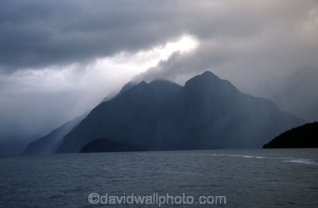 cloud;clouds;cloudy;fiordland-national-park;grey;hill;hills;lakes;mountain;mountains;rain-raining;shower;showers;storm;weather