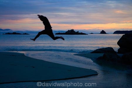 Abel-Tasman;Abel-Tasman-N.P.;Abel-Tasman-National-Park;Abel-Tasman-NP;beach;beaches;boy;boys;coast;coastal;coastline;coastlines;coasts;creek;creeks;dusk;evening;hot;jump;jumping;Mosquito-Bay;N.Z.;national-park;national-parks;Nelson-Region;New-Zealand;night;night_time;nightfall;NZ;ocean;oceans;S.I.;sea;seas;shore;shoreline;shorelines;shores;silhouette;silhouettes;South-Is;South-Island;Sth-Is;stream;streams;summer;sunset;sunsets;Tasman-Bay;Tasman-District;teenager;teenagers;twilight;water