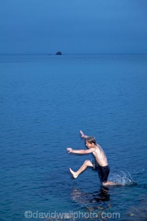 boy;boys;child;children;coast;coastal;coastline;coastlines;coasts;Doubtless-Bay;dusk;evening;foreshore;fun;jump;jumping;Karikari-Peninsula;kid;kids;little-boy;little-boys;N.I.;N.Z.;New-Zealand;NI;night;night-time;North-Is;North-Is.;North-Island;Northland;NZ;ocean;Parakerake-Bay;play;playing;sea;shore;shoreline;shorelines;shores;twilight;water;Whatuwhiwhi
