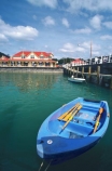 blue;boat;color;colour;dingy,rowboat;docked;harbor;harbors;harbour;harbours;marina;moored;oars;water;wharf;wharves