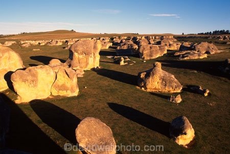 amphitheatre;formations;formed;geological;grassy;light;limestone;natural;process;rock;shape;shaped;sunlight;unusual;weathering