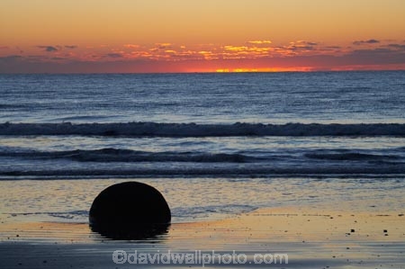 beach;beaches;boulder;break-of-day;calm;coast;coastal;coastline;coastlines;coasts;concretion;dawn;dawning;daybreak;first-light;formation;geological;geology;marble;marbles;Moeraki;Moeraki-Boulder;Moeraki-Boulders;morning;N.Z.;New-Zealand;North-Otago;NZ;ocean;orange;Otago;placid;quiet;reflection;reflections;rock;rocks;round;S.I.;sand;sea;sedementary;serene;shore;shoreline;shorelines;shores;SI;smooth;South-Island;sphere;still;sunrise;sunrises;sunup;tranquil;twilight;Waikati-District;Waitaki-District;water