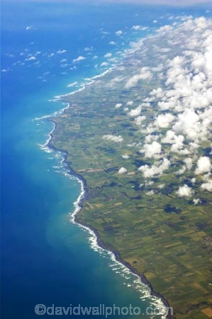 aerial;aerials;agriculture;cloud;clouds;coast;coastal;coastline;dairy;farm;farmland;farms;field;fields;grass;green;hedgerow;hedgerows;high-altitude;land;lush;meadow;meadows;new-zealand;north-is.;north-island;ocean;paddock;paddocks;pasture;pastures;plain;plains;run-off;run_off;rural;sea;shore;shoreline;South-Taranaki;tasman-sea;verdant;water