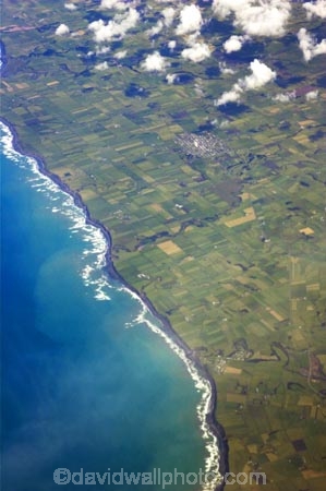 aerial;aerials;agriculture;cloud;clouds;coast;coastal;coastline;dairy;farm;farmland;farms;field;fields;grass;green;hedgerow;hedgerows;high-altitude;land;lush;meadow;meadows;new-zealand;north-is.;north-island;ocean;paddock;paddocks;pasture;pastures;plain;plains;run-off;run_off;rural;sea;shore;shoreline;South-Taranaki;tasman-sea;verdant;water