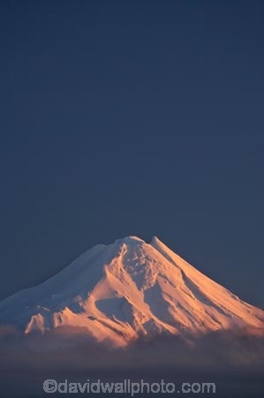 alpenglo;alpenglow;alpine;alpinglo;alpinglow;break-of-day;cloud;clouds;cloudy;color;colors;colour;colours;dawn;dawning;daybreak;Egmont-N.P.;Egmont-National-Park;Egmont-NP;first-light;fog;foggy;fogs;mist;mists;misty;morning;Mount-Egmont;Mount-Taranaki;Mount-Taranaki-Egmont;Mountain;mountainous;mountains;mt;Mt-Egmont;Mt-Taranaki;Mt-Taranaki-Egmont;mt.;Mt.-Egmont;Mt.-Taranaki;Mt.-Taranaki-Egmont;N.I.;N.Z.;New-Zealand;NI;North-Is;North-Is.;North-Island;NZ;orange;season;seasonal;seasons;snow;sunrise;sunrises;sunup;Taranaki;volcanic;volcano;volcanoes;winter