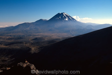 cloud;cone;crater;craters;environment;figure;fog;man;mist;misty;mountain;mystery;nature;peak;peaks;person;photographer;slope;slopes;snow;spectator;sunrise;volcanic;volcano
