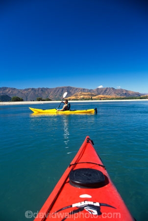 kayak;kayaks;kayaking;kayaker;kayakers;vibrant;colour;holiday;vacation;relax;recreation;recreational;water;lake;paddle;paddling;river;central-otago;red-kayak;red-kayaks;yellow-kayak;yellow-kayaks;green-water;triangle;tip;front;side;peak