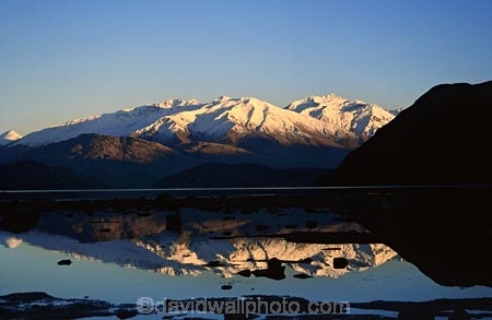 reflect;reflecting;reflection;dusk;dawn;silhouette;snow;snow-cap;snow-caps;snow_caps;snow-capped;snow-capped;snow_capped;mountain;mountains;tranquil;still;stillness;calm;peaceful