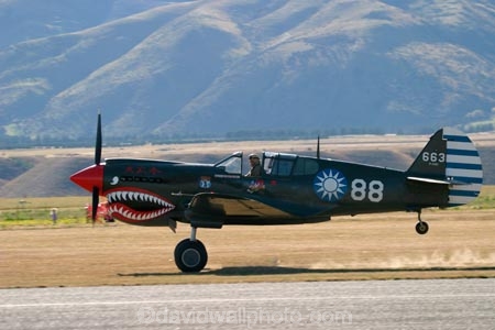 aeroplane;aeroplanes;air-craft;air-display;air-displays;air-force;air-show;air-shows;aircraft;airforce;airplane;airplanes;airshow;airshows;aviating;aviation;aviator;aviators;battle-of-the-pacific;combat;curtis;curtiss-kitthawks;curtiss-kittyhawk;curtiss-p_40-kittyhawk;demonstration;display;displays;fighter;fighter-plane;fighter-planes;fighters;flight;flights;fly;flyer;flyers;flying;kittyhawk;kittyhawks;military;new-zealand;nz;p40;p40-kittyhawk;pilot;pilots;plane;planes;sky;south-island;wanaka;war;warbird;warbirds;warbirds-over-wanaka;wars;world-war-2;world-war-two;ww2;WWII