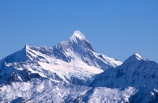 mountain;mountains;peak;peaks;snow;snowy;sharp;point;pointy;powder-snow;rocky;jutting;shade;shadow;shadows;blue;winter
