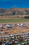 car;cars;plane;planes;aeroplane;aeroplanes;crowd;audience;tent;tents;airshow;air-show;air-strip;airstrip;row;rows;row-of-cars;people