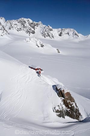 above;aerial;aerial-photo;aerial-photograph;aerial-photographs;aerial-photography;aerial-photos;aerial-view;aerial-views;aerials;Agassiz-Glacier;alp;alpine;alps;back-country-hut;backcountry;backcountry-hut;backcountry-huts;Centennial-Hut;climbers-hut;climbers-huts;cold;danger;Davis-Snow-Field;Davis-Snowfield;DOC-hut;DOC-huts;Frans-Josef-Glacier-neve;Frans-Josef-neve;Franz-Josef-Glacier;glacial;glacier;glaciers;high-altitude;high-country-hut;highcountry;highcountry-hut;highcountry-huts;hikers-hut;hikers-huts;huits;hut;ice;icy;main-divide;mount;Mount-Jervois;mountain;mountain-hut;mountain-huts;mountaineers-hut;mountaineers-huts;mountainous;mountains;mountainside;mt;Mt-Jervois;mt.;Mt.-Jervois;N.Z.;neve;New-Zealand;NZ;outdoors;range;ranges;S.I.;SI;Ski-Tracks;snow;snowy;South-Is.;South-Island;South-West-New-Zealand-World-Heritage-Area;southern-alps;Te-Poutini-National-Park;Te-Wahipounamu;trampers-hut;trampers-huts;West-Coast;Westland;westland-national-park;White;winter;World-Heritage-Area