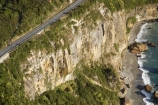 aerial;aerial-photo;aerial-photograph;aerial-photographs;aerial-photography;aerial-photos;aerial-view;aerial-views;aerials;bluff;bluffs;cliff;cliffs;coast;coastal;coastline;coastlines;coasts;driving;highway;highways;Irimahuwheri-Bay;N.Z.;national-park;national-parks;New-Zealand;NZ;ocean;open-road;open-roads;Paparoa-National-Park;Perpendicular-Point;Punakaiki;road;road-trip;roads;S.I.;sea;shore;shoreline;shorelines;shores;SI;South-Island;spectacular-road;spectacular-roads;State-Highway-6;State-Highway-Six;steep;Tasman-Sea;transport;transportation;travel;traveling;travelling;trip;water;West-Coast;Westland