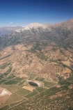 aerial;aerial-photo;aerial-photograph;aerial-photographs;aerial-photography;aerial-photos;aerial-view;aerial-views;aerials;agricultural;agriculture;Andean-cordillera;Andes;Andes-Mountain-Range;Andes-Mountains;Andes-Range;Chile;country;countryside;crop;crops;cultivation;farm;farming;farmland;farms;field;fields;grape;grapes;grapevine;horticulture;mountain;mountain-peak;mountainous;mountains;row;rows;rural;Santiago;South-America;Sth-America;vine;vines;vineyard;vineyards;vintage;wine;wineries;winery;wines