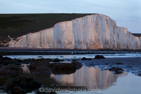 afternoon-light;bluff;bluffs;Britain;British-Isles;calm;chalk-cliff;chalk-cliffs;chalk-downland;chalk-downlands;chalk-downs;chalk-formation;chalk-formations;chalk-headland;chalk-headlands;chalk-layer;chalk-layers;cliff;cliffs;coast;coastal;coastline;coastlines;coasts;Cretaceous-chalk-layer;Cuckmere-Beach;Cuckmere-Haven;down;downland;downlands;downs;East-Sussex;England;English;English-Chanel;eroded;erosion;Europe;foreshore;formation;formations;G.B.;GB;geological;geological-formation;geological-formations;geology;Great-Britain;image;images;late-light;layer;layering;layers;limestone;low-tide;low-tides;natural;natural-landscape;natural-landscapes;ocean;oceans;photo;photos;placid;quiet;reflection;reflections;rock-formation;rock-formations;S.E.-England;SE-England;sea;Seaford;seas;sedimentary-layer;sedimentary-layers;serene;Seven-Sisters;Seven-Sisters-Chalk-Cliffs;Seven-Sisters-Cliffs;Seven-Sisters-Country-Park;shore;shoreline;shorelines;shores;smooth;South-Downs;South-Downs-N.P.;South-Downs-National-Park;South-Downs-NP;South-East-England;Southern-England;steep;still;stone;strata;stratum;Sussex;The-Seven-Sisters;tidal;tide;tides;tranquil;U.K.;UK;United-Kingdom;unusual-natural-feature;unusual-natural-features;unusual-natural-formation;unusual-natural-formations;water;white-chalk-cliff;white-chalk-cliffs;White-Cliff;white-cliffs