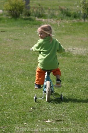 girl;girls;little;child;children;play;playing;playground;play_ground;play-ground;playgrounds;play_grounds;play-grounds;grass;green;grassy;outdoor;outdoors;outside;playtime;fun;moving;movement;childhood;happiness;happy;joy;kid;kids;bike;bikes;cycle;cycles;bicycle;bicycles;two_wheeler;two-wheeler;two_wheelers;two-wheelers;training-wheels;training_wheels;learn;learns;learning;learner;first-ride;ride;rider;riding;riders;training;daughter